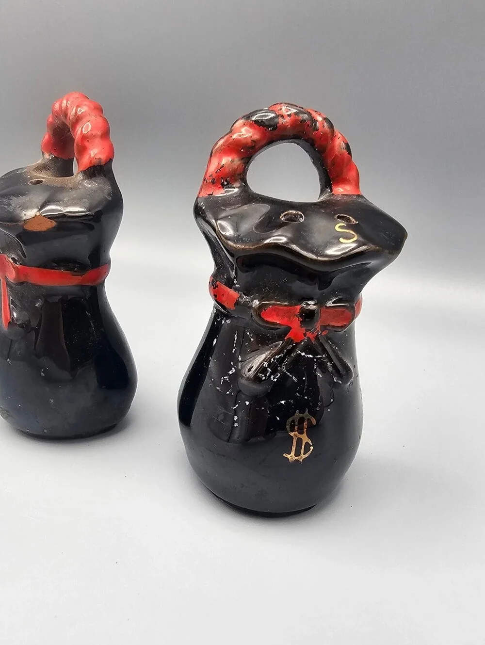 Vintage Black Ceramic Money Bag Salt and Pepper Shakers with Red Handles